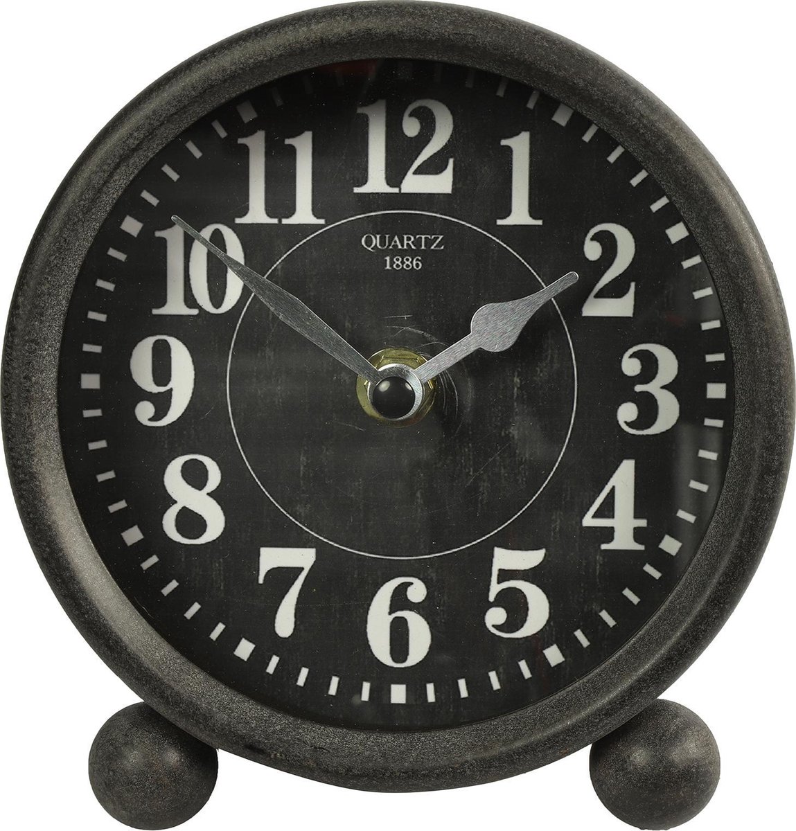 Vintage black alarm clock with white numbers