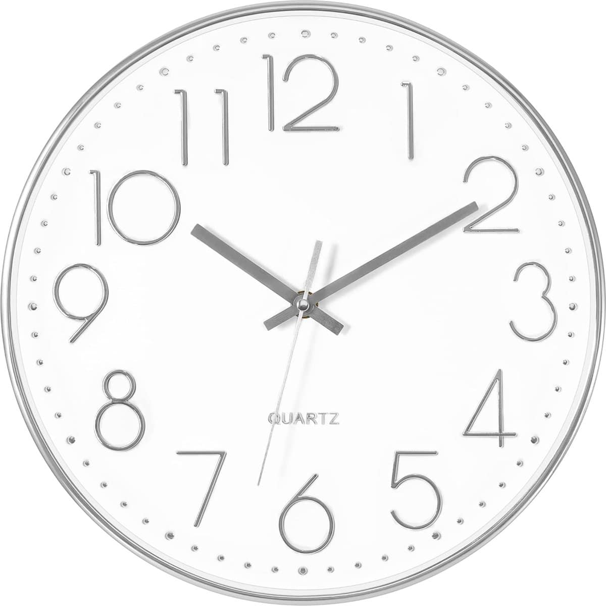 White round clock with silver numerals and hands.