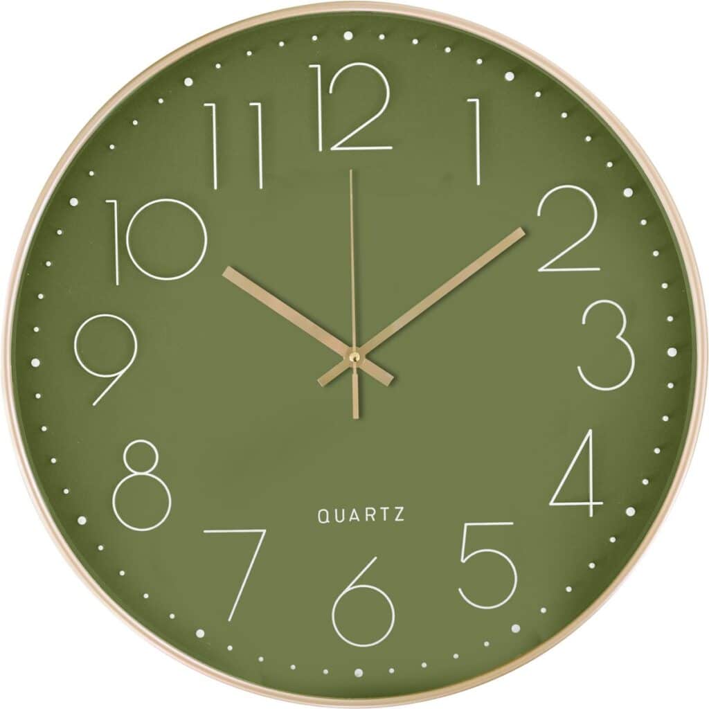 Green wall clock with white numerals on dial.